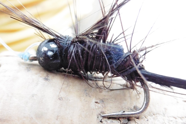 I´ve tied some ugly flies before but this one, further mutilated at the riverside is about as ugly as they come!